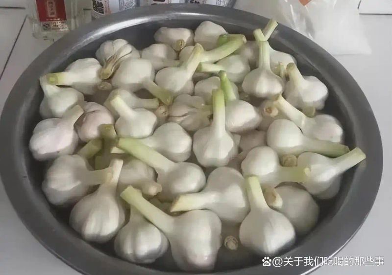 浙江土池腌糖蒜方法